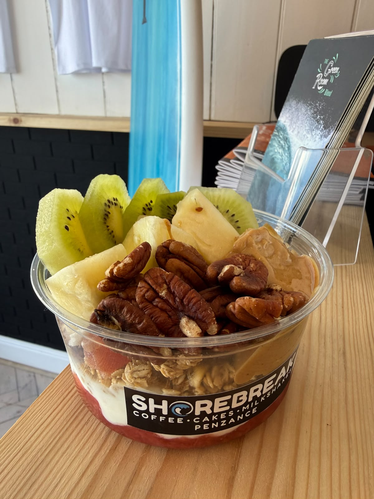 Granola bowl with pineapple, kiwi and pecans