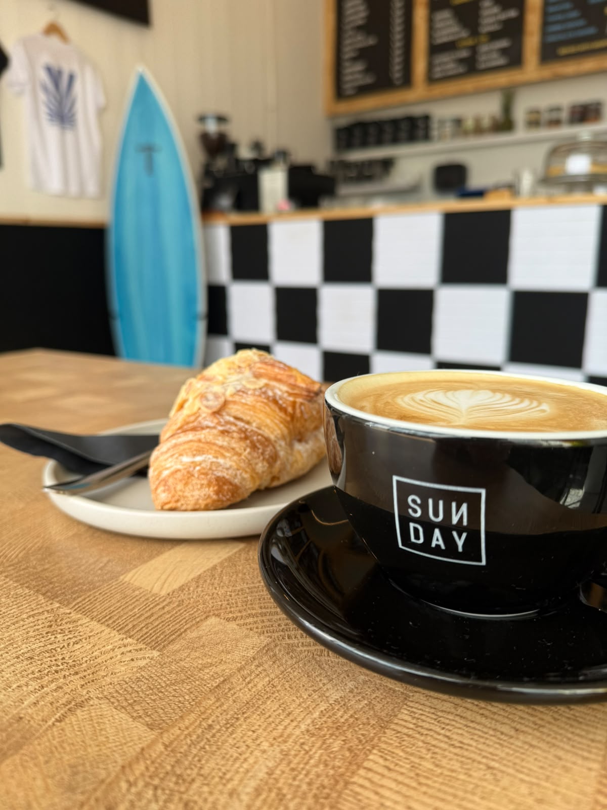 Flat white and almond croissant