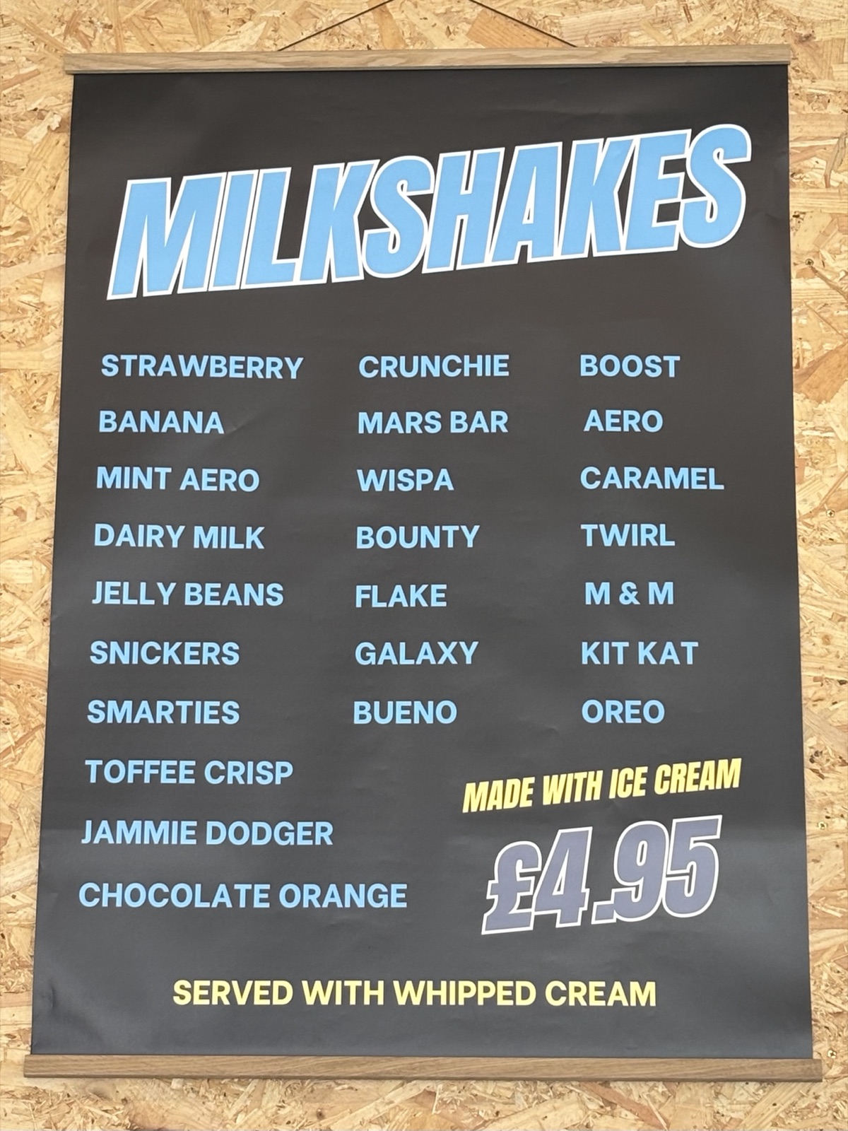 Milkshakes menu board — over twenty flavours made with ice cream and whipped cream